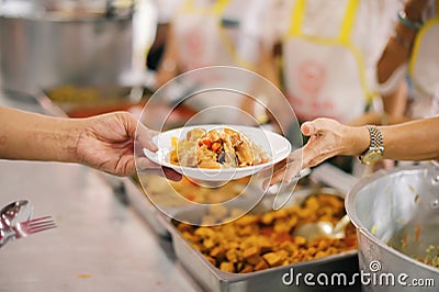 Distribute free food to the poor - share food for the hungry Stock Photo
