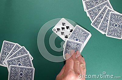 The distribution of playing cards. Stock Photo