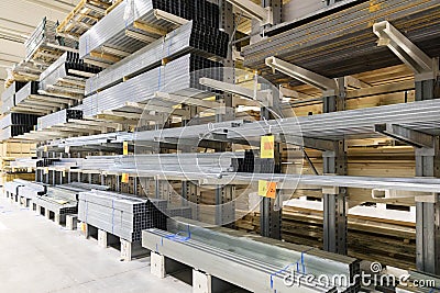 Distribution warehouse shelves with metal profiles Stock Photo