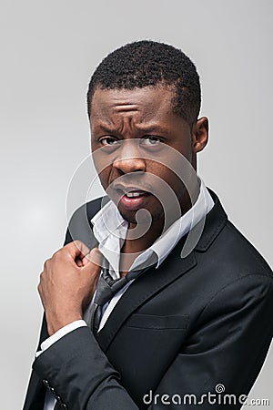 Distrustful afroamerican guy. Misfaith, disbelief. Stock Photo