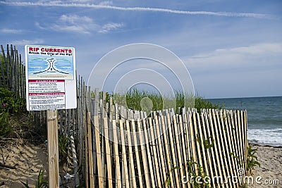 Ditch Plains beach Montauk Long Island New York in the Hamptons with rip current warning sig Editorial Stock Photo