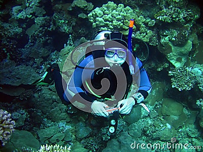 Diver in deep Stock Photo