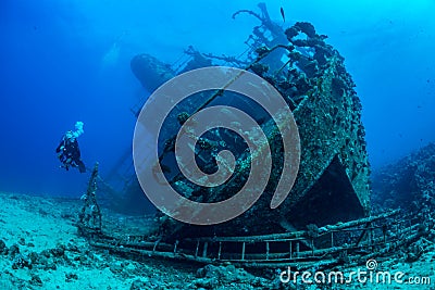 Diver exploring Red Sea wreck Stock Photo