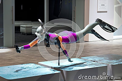 Diver mannequin holding a GoPro action camera at CES Editorial Stock Photo