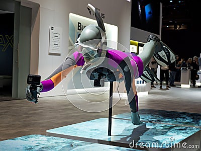 Diver mannequin holding a GoPro action camera at CES Editorial Stock Photo