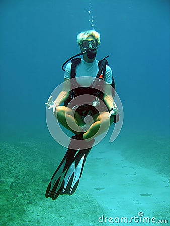 Diver weightless underwater Stock Photo