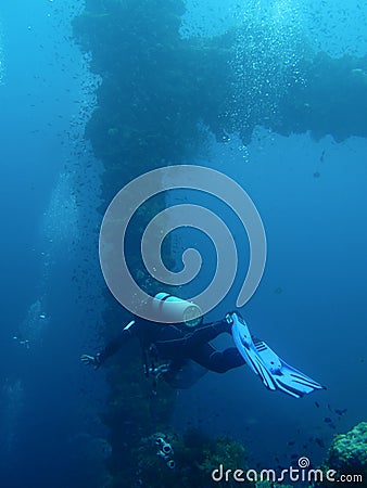 Diver in wreck dive deep blue sea Stock Photo