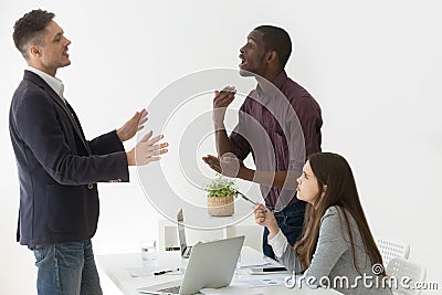 Diverse african and caucasian colleagues having dispute at group Stock Photo