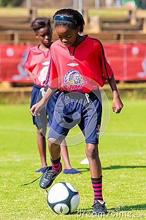 Diverse children playing soccer football at school Editorial Stock Photo