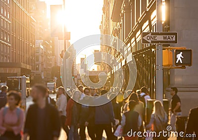 Diverse crowd of anonymous people walking down a busy street in New York City Editorial Stock Photo