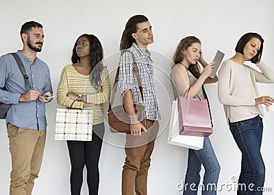 Diverse ethnic people in a line waiting Stock Photo