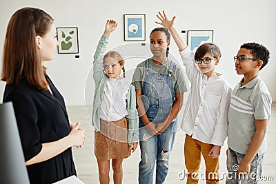 Group of Schoolkids Visiting Art Gallery Stock Photo
