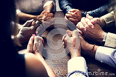 Diverse Group Of Christian People Praying Together Stock Photo