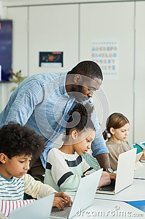 Diverse Group of Kids in IT Class Stock Photo