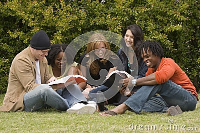 Diverse group of people reading and studying. Stock Photo