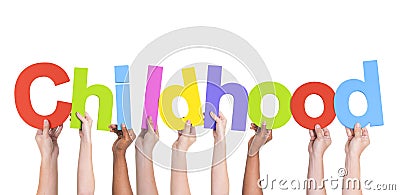 Diverse Hands Holding The Word Childhood Stock Photo