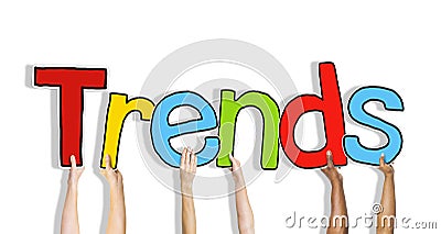 Diverse Hands Holding the Word Trends Stock Photo