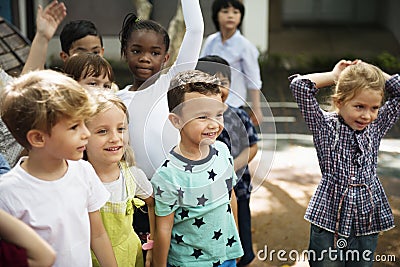 Diverse kids standing together Stock Photo