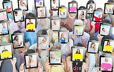 Diverse People Holding Digital Device on their Face Stock Photo