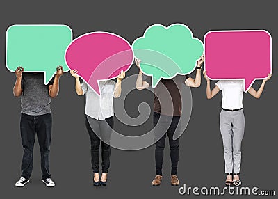 Diverse people showing speech bubble symbols Stock Photo