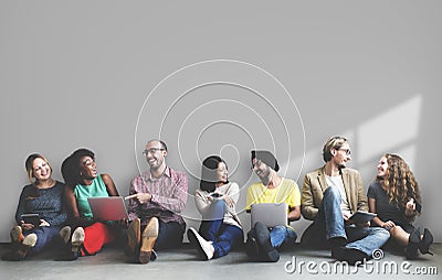 Diverse people sitting and hanging out Stock Photo