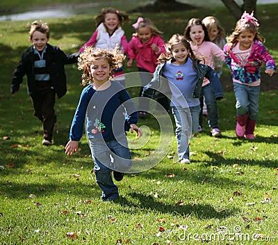 Diverse running kids Stock Photo