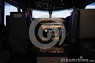 Diverse team of captain and pilot pushing engine throttle Stock Photo