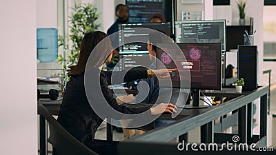 Diverse team of coders having server hacked and system crash Stock Photo