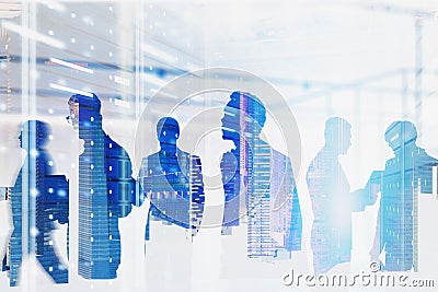 Diverse team of computer engineers in server room Stock Photo