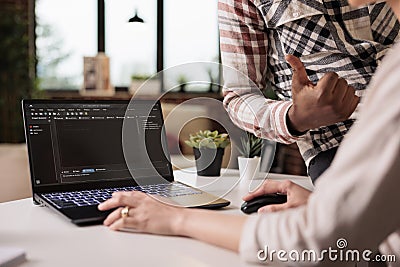 Diverse web developers programming html script Stock Photo