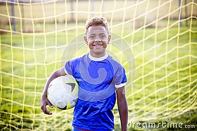 Diverse young boy on a youth soccer team Stock Photo