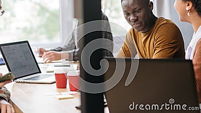 diversified business people work in a coworking center. Stock Photo