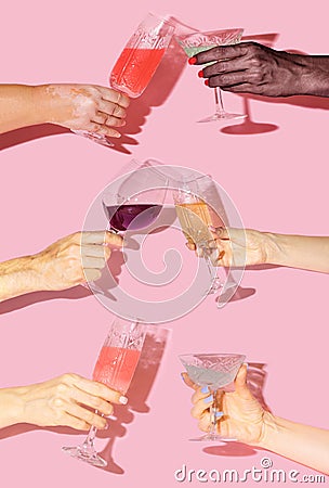 Diversity cheers concept. Man, Girls hands, one with vitiligo hand holding antique crystal glasses with lovely drinks in it Stock Photo