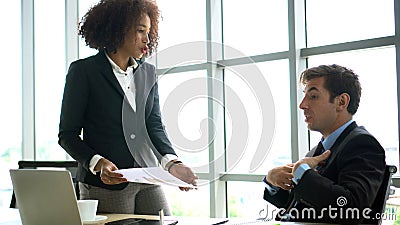 Diversity ethnic at work professional opinion conflict arguement Stock Photo