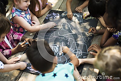 Diversity Group Of Kids Drawing Chalk Board Stock Photo