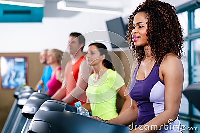 Diversity group of people on treadmill in gym Stock Photo