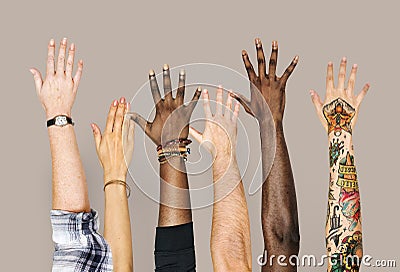 Diversity hands raised up gesture Stock Photo