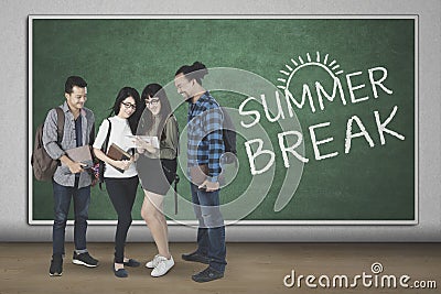 Diversity students with text of summer break Stock Photo