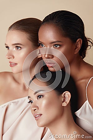 Diversity. Women Beauty Portrait. Multi-Ethnic Models Standing Together And Looking Away. Asian, Mixed Race And Caucasian Female Stock Photo