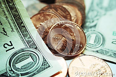 Dividends & Capital Gains With Pennies & One Dollar Bills High Quality Stock Photo