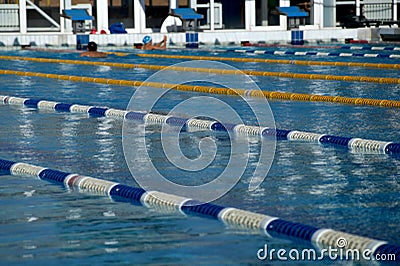 Dividers of paths in the big swimming pool Stock Photo