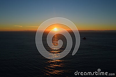 Divine sunset in the horizon Stock Photo