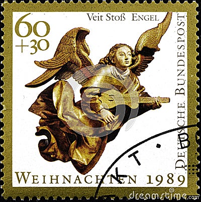 02 09 2020 Divnoe Stavropol Territory Russia the postage stamp Germany 1989 Christmas Stamps flying angel with a guitar Editorial Stock Photo