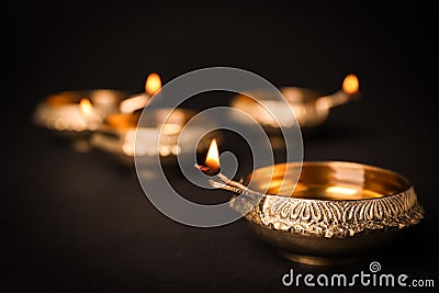 Diwali diyas or clay lamps on black background Stock Photo