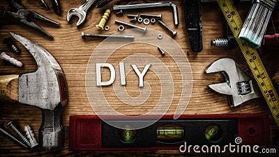 DIY Do It Yourself in Wooden Letters and Tools Stock Photo