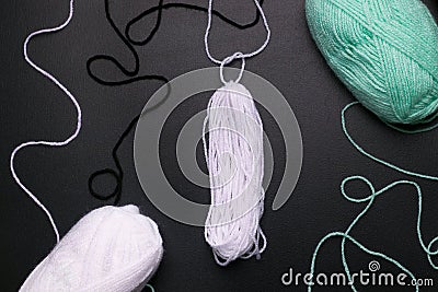 DIY Halloween thread ghost step by step. Image two. Tie the threads in the center. Stock Photo
