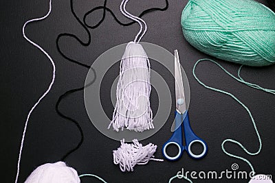 DIY Halloween thread ghost step by step. Image three. cut the edge of the product. Stock Photo