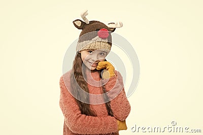 Diy and handmade handcrafted goods. Playful cutie. Adorable baby wear cute winter knitted deer hat. Cute reindeer with Stock Photo