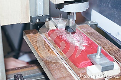 DIY Mini CNC Machine for 3D carving. Process of 3D cutting, machining and sculpting. Stock Photo