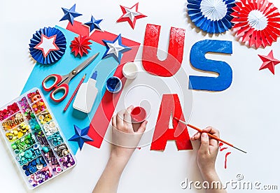 Diy 4th of July decor USA letters color American flag. Children craft Stock Photo